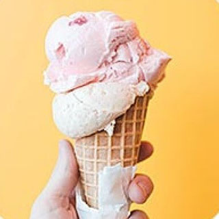hand holds pink ice-cream
